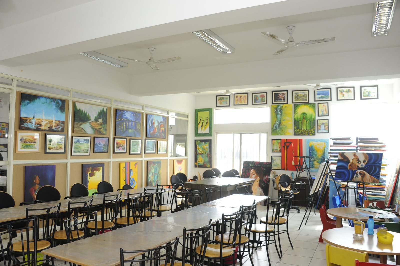 Students working on structured art curriculum inside a branded Konsult centre
